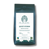 Coffee bag labeled 'Quiet Storm' from 'The Mental Bean' on a white background