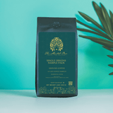 The Mental Bar Single Origin Coffee Sample Pack featuring 6 coffee bags of ground coffee in an elegant design.
